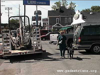 Photo - Blind pedestrians and borderless parking lots.